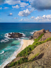 Wall Mural - Merese Hill in Lombok is a hill famous for its beauty for a long time, and is even popular among visitors from abroad, beach and hill, view of the sea from the Hill, danger cliff edge, dog on the hill