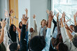 © Jacob Lund - Diverse business group raising hands at conference event for team building and collaboration