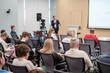 © Anton Gvozdikov - Business presentation with audience attending lecture. Speaker presenting to group of people in conference setting