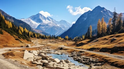 Wall Mural - Majestic Mountain Range with a Stream in the Foreground