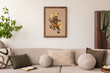 © FollowTheFlow - Cozy living room with a beige sofa adorned with textured and patterned pillows. A framed art piece depicting a bird and a woman hangs on the wall. A potted plant and book add to the serene atmosphere.