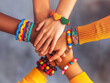 © ภวัต สายวงค์ - Four hands together Decorate with colorful friendship bracelets.