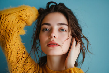 Poster - A woman in a yellow sweater is posing for a picture.