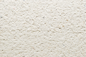 Wall Mural - A sheet of gray porous recycled cardboard texture as background