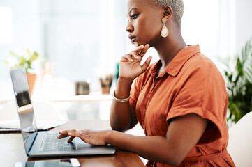 Poster - Typing, online and black woman with laptop, writer and thinking for ideas in office and copywriting. Serious, working and creative for website on desk, reading and confident in company and person