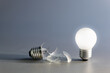 © patpitchaya - Comparative a broken and a glowing light bulb, old and new idea, failure and success, self development, and learning from mistakes