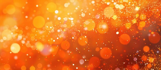 Leinwandbilder - A vibrant orange abstract background with sparkling bokeh effects creates an appealing display ideal for showcasing content with copy space image