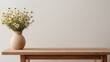 © SAQLAIN ABBAS - wooden table with beige clay vase with bouquet of charmful flowers