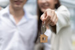 © Pormezz - Happy couple showing house key after buy home success