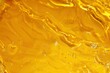 © nevodka.com - Golden liquid honey or syrup with bubbles abstract background