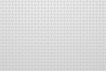 Seamless grey pattern with white oval cutouts.