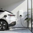 © KayKai - A white car is charging at a charging station