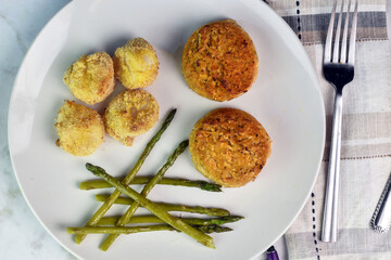 Wall Mural - two crab cakes  served with baked scallops