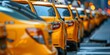 © kwanchaift - Row of yellow taxis waiting in line at a taxi stand, depicting traditional urban transportation services