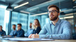 © Kateryna - a young designer presenting his new ideas to colleagues in a stylish conference room. Business people actively engaged in discussing a new business project in a professional settin