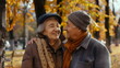 © dobok - Elderly Couple Enjoying Autumn Together Smiling Warmly Outdoor Park