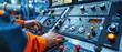 © Anutha - Close-up of a drilling operator's hands adjusting controls on a drilling rig, showcasing precision and industry expertise