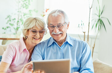 Wall Mural - woman couple senior man happy internet love tablet call video communication online internet mature a
