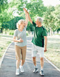 © Lumos sp - outdoor senior fitness woman man lifestyle active sport exercise healthy fit couple running jogging elderly mature having fun laughing talking together friend hug break