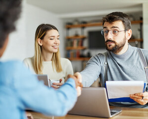 Wall Mural - couple house business office agent estate real handshake meeting job interview recruitment employee employment work career candidate agreement