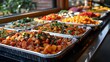 © Linus - A table full of food with a variety of dishes including carrots, potatoes