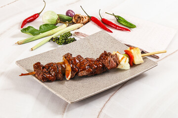 Poster - Asian grilled beef skewer with vegetables and pineapple