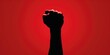 © vefimov - Red poster with a fist in the air, symbolizing strength and resistance against oppressive forces.