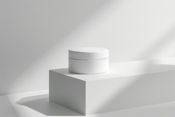 Poster - A minimalist white round container placed elegantly on a raised display block, casting soft shadows and illuminated by gentle natural light to create a serene ambiance.