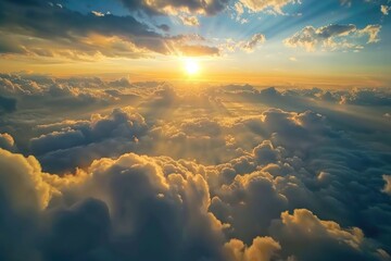 Poster - A serene image of the sun setting behind a bank of clouds