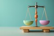 © nsit0108 - Balance scale comparing two colored bowls symbolizing equilibrium and decision making