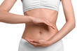 © New Africa - Healthy digestion. Woman holding something near her belly on white background, closeup