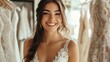 © Oulailux - A woman is smiling in front of a rack of wedding dresses