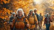 © Boomanoid - Senior woman hiking through autumn forest