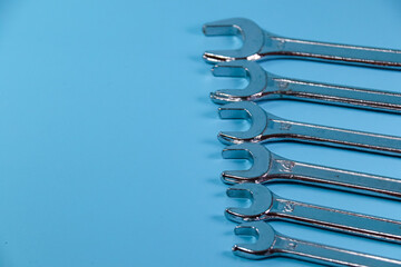 stainless wrench set on blue background