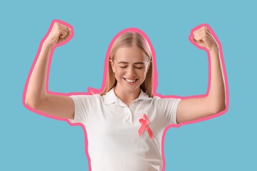 Wall Mural - Happy young woman with pink ribbon on blue background. Breast cancer awareness concept