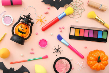 Wall Mural - Composition with different makeup products and Halloween decor on beige background