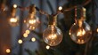 © PaulShlykov - vintage light bulb hanging from ceiling for decoration in living room.
