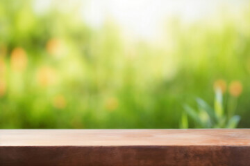 Wall Mural - Empty wooden tabletop with blurred green garden background for product placement