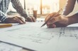 © Dmitrii - Collaborating On Architectural Blueprints In Modern Office During Late Afternoon Light