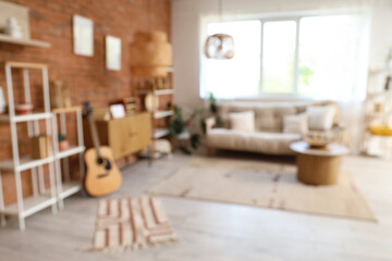 Poster - Blurred view of living room with sofa, shelf units and drawers