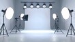 © VISUAL BACKGROUND - A photo studio with lighting equipment in a white room