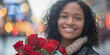 © Duka Mer - Close-up of a woman smiling with roses on Valentine's Day, against a blurred background with a bokeh effect, capturing a candid street moment.