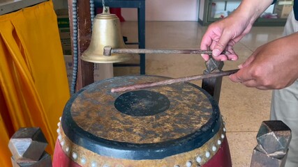 Wall Mural - traditional drum temple, gold bell hanging, Church bells ringing in celebration, ringing the bells, Tibetan prayer, Buddhism