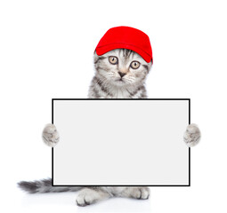 Poster - Cute kitten wearing red cap holds blank white banner. isolated on white background