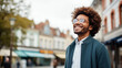 © rohappy - Confident happy smiling black entrepreneur standing in the city, wearing glasses and looking away