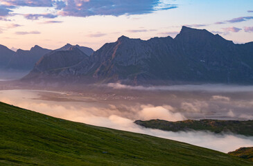 Wonderful nature with lakes and mountains during the midnight sun in Lofoten