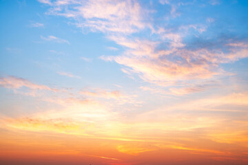 Wall Mural - beautiful , luxury soft gradient orange gold clouds and sunlight on the blue sky perfect for the bac