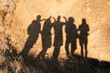 © Milou Dirks - silhouette of 5 persons on rocky wall during sunrise while hiking at Pico Arieiro, Madeira