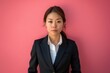 © Maki_Japan - 真顔の女性ビジネスマンのポートレート（ストレス・我慢・転職・決意・悩み）