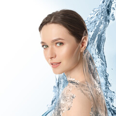 Poster - Gorgeous woman and splashes of water on gradient background